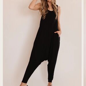Momper Romper Black Sleeveless Stretchy Jumpsuit. Size Medium.